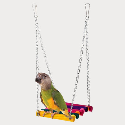 a bird is sitting on a toy swing